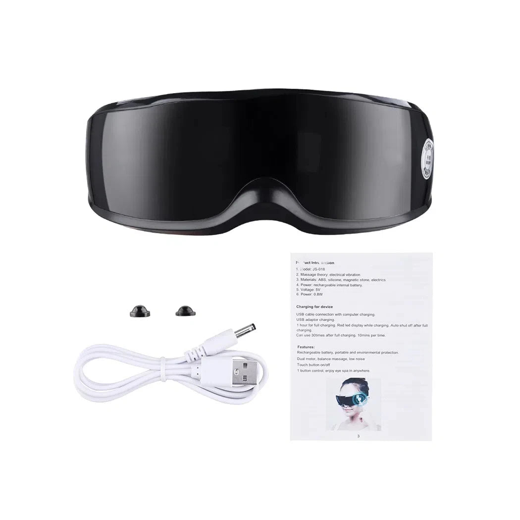 EyeMassager med USB-kabel och manual