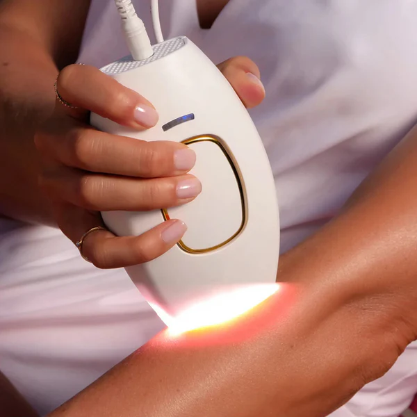 HairLess IPL-enhet med aktiverad ljusimpuls