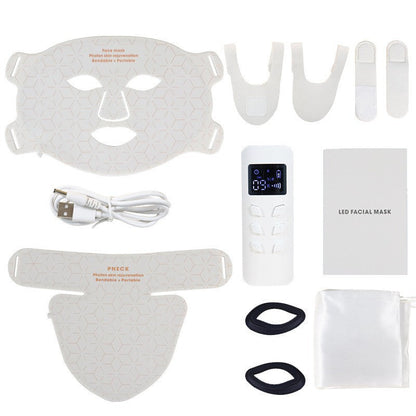 Vitt paket med mask, halsdel och fjärrkontroll